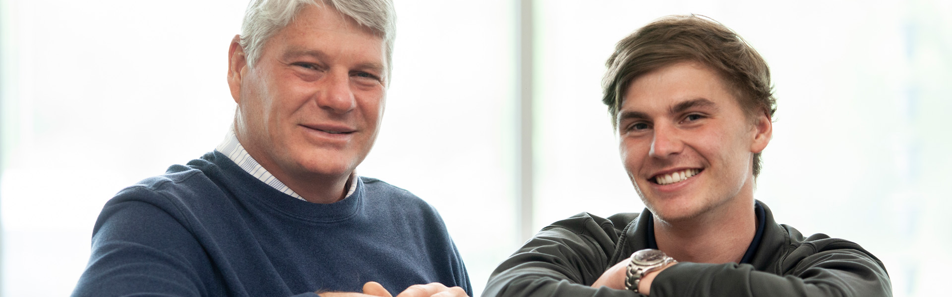 Lauterbach men smiling at camera